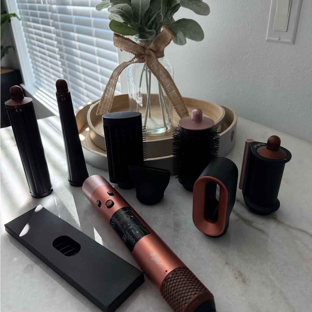 Dyson multi-styler in rose gold and black